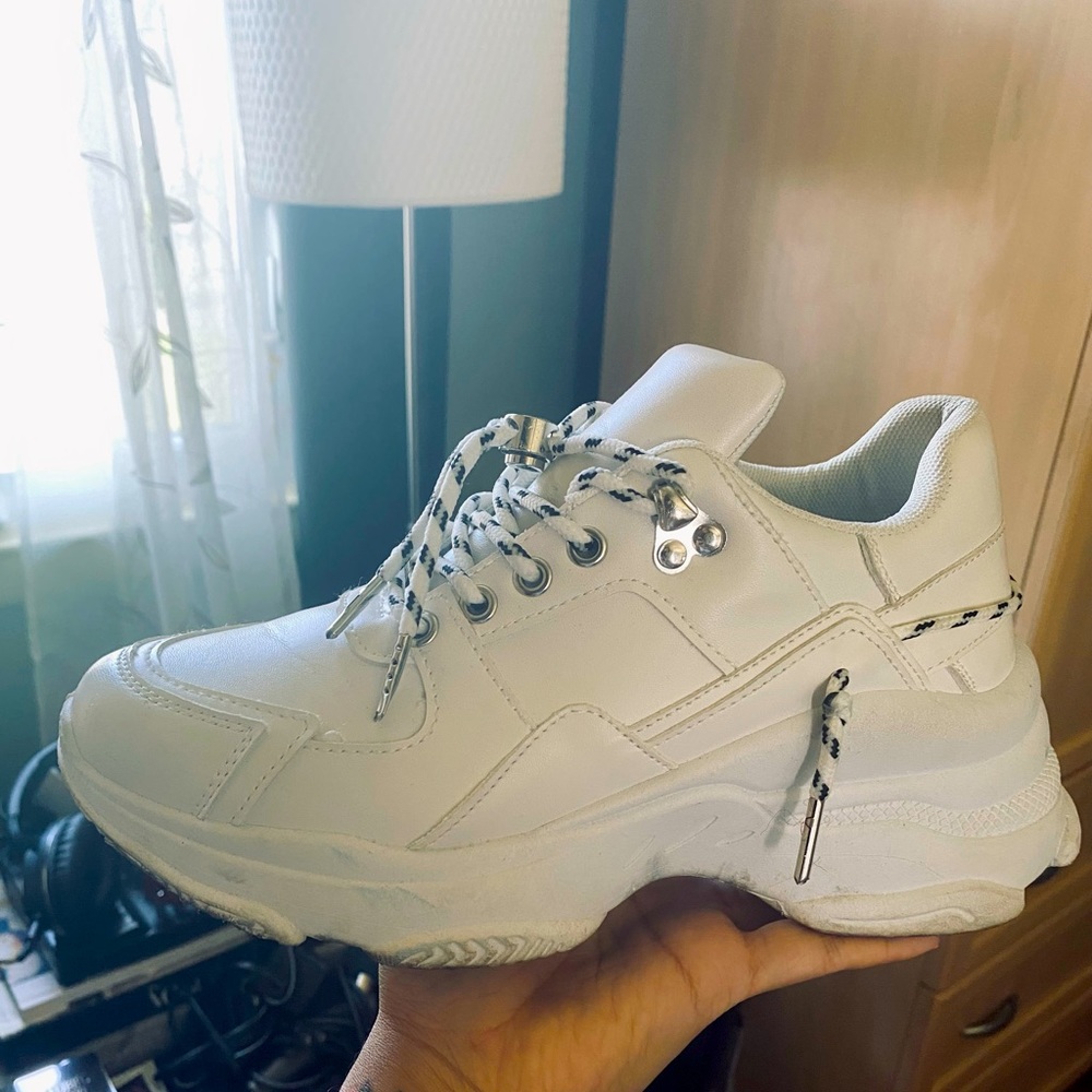 Lightly worn white Raid sneakers